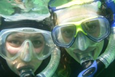 Two snorkelers out enjoying a quarry in Ohio